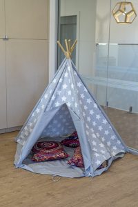 a tent image of nido child care centre in wembley